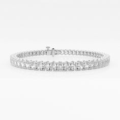 If you don't want the attention, then this one's not for you. Gorgeous oval shaped lab grown diamonds set in a fluid tennis bracelet setting, it almost looks like a royal heirloom that has been passed down! Classic White Moissanite Bracelets, Modern White Tennis Bracelet For Wedding, White Diamond Bracelet With Moissanite Accents, White Moissanite Diamond Cut Bracelet, Modern White Diamond Bracelet For Wedding, Luxury Oval Tennis Bracelet, Modern White Tennis Bracelet For Formal Occasions, Modern White Diamond Cut Bracelet, White Diamond Bracelet With Moissanite And Diamond Accents