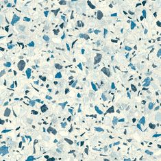 an abstract blue and white background with speckles on the surface, like paint