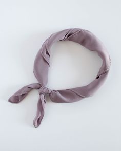 A life essential for you to take anywhere, each scarf is made from 100% washable-silk, has a hand-rolled and hand-sewn edge. Meant to be lived-in, worn, and washed, our hand-dyed heirloom scarves have a bit of magic in their making. The Scout Washable Silk Scarf is our medium size scarf: approximately 23 inches x 23 inches. The silk is soft in hand and light in weight, an uber elegant bandana. With endless ways to wear it—on your shoulders, around your neck, or over your hair on a summer day—you Chic One Size Silk Scarf, Chic Solid Scarves For Spring, Chic Solid Color Silk Scarf, Chic Silk Scarf, Scout Scarf, Chic Scarves, The Scout, Mauve Color, Silk Pillowcase