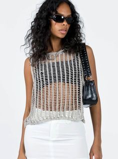 Show off your trendsetter style in this allery crochet knit sleeveless tank. Crafted from lightweight, airy fabric, this stylish tank is perfect for all your summer looks. It's the perfect companion for your shorts, jeans, and skirts! (And yeah, you look totally hot in it). Size Guide: Model is 5’5” tall, and has a 33.1” bust, 24.6”waist, & 37.2” hips. She is wearing a S / US 4 / AU 8. This tank is true to size. Material: 100% Acrylic. Key Features: Relaxed fit. Pull-on. Crochet Knit Fabrication Spring Knit Tank Top, Trendy Sleeveless Stretch Mesh Top, Trendy Stretch Sleeveless Mesh Top, Pointelle Knit Tank Top, Pointelle Knit Tank Top For The Beach, Pointelle Knit Sleeveless Tank Top For Beach, Sleeveless Pointelle Knit Tank Top For Beach, Sleeveless Summer Pointelle Knit Tops, Sleeveless Top With Pointelle Knit For Vacation