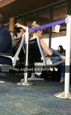 people sitting in chairs at an airport with the words hey, jughead and betty