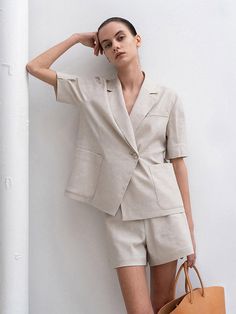 Editor's NotesThe summer patns is cut from herringbone patterned linen and upgrades your summer outfit- Classic shorts- Matte cow horn button- Button closure with zip flt- Side pockets- Set up with Herringbone Puffed Half Sleeve JacketMeasuremets(in.)- S:       Waist     27.4in.,        Hip     37.1in.,        Length     14.6in.              - M:        Waist     29.4in.,        Hip     39in.,        Length     15in.              - L:        Waist     31.9in.,        Hip     41in.,        Length     15.4in.  *Model size- Height 176cm-        Bust     31.2in.,        Waist     24.5in.,        Hips     33.9in.  Composition & Care- 55% Polyester, 14% Linen, 28% Cotton, 3% Polyurethane- Dry cleaningDesigner- Made in Korea- by RE RHEE Neutral Workwear Shorts With Pockets, Spring Beige Shorts With Patch Pockets, Neutral Summer Shorts With Pockets, Beige Patch Pocket Shorts For Summer, Neutral Linen Shorts With Pockets, Neutral Linen Shorts For Summer, Beige Summer Shorts With Patch Pockets, Spring Neutral Shorts With Pockets, Summer Neutral Linen Shorts