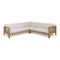 the corner sofa is made from wood and has white cushions