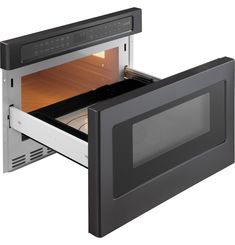 an open microwave oven with the door wide open