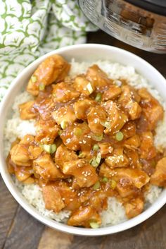 a white bowl filled with chicken and rice