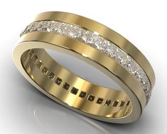 a gold wedding ring with channeled diamonds