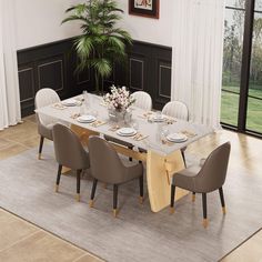 a dining room table with chairs and plates on it in front of a large window