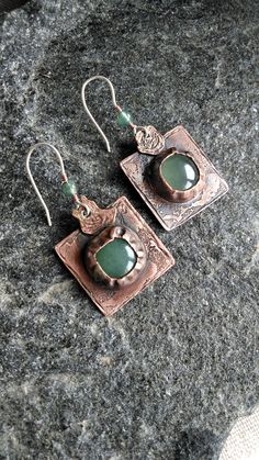 "Handmade earrings \"Patterns of Time\" will set the mood and add charm to your everyday look. The green gemstone will accentuate the color of your eyes or your outfit! It's essential to remember that earrings, with their color and shape, complete your overall appearance!" Artisan Green Copper Jewelry, Green Artisan Dangle Earrings, Green Gemstone Artisan Earrings, Green Artisan Gemstone Earrings, Artisan Green Gemstone Earrings, Artisan Green Drop Earrings, Handmade Drop Earrings For May Birthstone, Handmade Round Emerald Earrings, Green Artisan Pierced Earrings