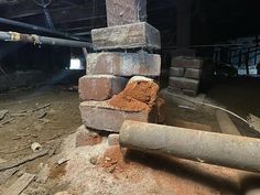 a pile of bricks sitting in the middle of a room