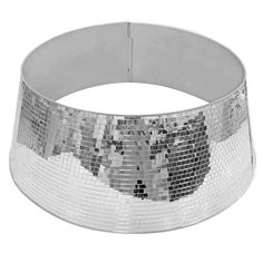 a silver bracelet that is on top of a white surface with black and white squares