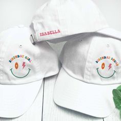 These pretty pastel birthday hats are a fun choice for you and your birthday squad! Personalize your birthday hats with the design and custom text of your choice.  These designs are available on our small fit hats (recommended for ages 5 - small adult) or our classic adult hats.  𝗗𝗘𝗦𝝞𝗚𝝢𝗦 * Birthday Girl * Birthday Squad 𝗣𝗘𝗥𝗦𝗢𝗡𝗔𝗟𝗜𝗭𝗘 𝗜𝗧 * Optional: Add 1 name or 1-2 lines of short custom text to the back 3.00 per hat)  (12 characters per name or 25 characters per line maximum) Playful Adjustable Dad Hat With Curved Brim, Funny White Adjustable Baseball Cap, White Snapback Hat For Party, White Snapback Party Hat, White Adjustable Baseball Cap For Party, Trendy Pink Hat For Birthday, Funny White Hat As A Gift, Funny White Hat As Gift, Trendy White Mini Hat For Party