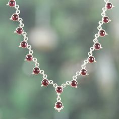 The splendor of the traditional Hindu dynasties survives the passage of time through jewelry artworks such as this superb design by Bhavya Jain of India. The artisan uses sterling silver to create this classic link necklace, whose high polish finish enhances each of the garnet jewels set around the accessory as a symbol of romantic beauty. Sterling Silver Temple Jewelry With Gemstone, Elegant Sterling Silver Gemstone Custom Necklace, Elegant Sterling Silver Custom Gemstone Necklace, Elegant Custom Sterling Silver Necklace With Gemstone, Elegant Hallmarked Sterling Silver Custom Necklace, Silver Polished Beads Jewelry For Celebration, Traditional Cabochon Necklace For Formal Occasions, Traditional Round Jewelry With Sterling Silver Clasp, Sterling Silver Temple Jewelry For Formal Occasions