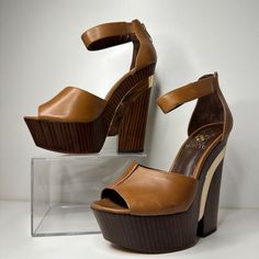 Brand New Vince Camuto Bailor Wedge In Fudge Brown. Shoe Box Not Included. Gleaming Metal Lends Sculptural Intrigue To An Ankle-Strap Wedge In Triple Neutral Hues. Back Zip Closure. Approx. Heel Height: 5" With A 2" Platform (Comparable To A 3" Heel). Leather Upper/Synthetic Lining And Sole. By Vince Camuto; Imported. Women's Shoes. Modern Brown Platform Wedge Sandals, Brown Platform Wedge Heels, Brown Platform Heels With Wedge Heel, Formal Brown Platform Wedge Sandals, Shoe Goals, Chunky Platform Heels, Platform Wedges Shoes, Beautiful Heels, Stunning Shoes