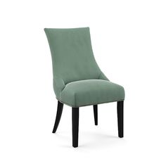 a green upholstered chair with black legs and nail polishing on the back