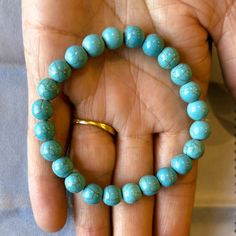 Turquois Bracelet (Gift Box, optional): - 2.5" Dia., 7.25" L - 8 mm Beads - Beads: Semi-precious gemstone - Quality beads with good hardness - Natural earthy material - Stretchable, one size fits all - Handmade - Natural beads makes every bracelet unique These natural turquoise beads not only look beautiful; it also known to enhance creativity leading to good fortune. As a popular fashion jewelry, it goes well with casual to professional clothing. Spiritual Turquoise Beaded Hypoallergenic Bracelet, Turquoise Gemstone Beads Stretch Bracelet As Gift, Turquoise Stretch Bracelet With Gemstone Beads As Gift, Turquoise Spiritual Stretch Bracelet With 8mm Beads, Turquoise Stretch Bracelet With Natural Stones As Gift, Turquoise Stretch Bracelet With Natural Stones For Gift, Spiritual Turquoise Stretch Bracelet With 8mm Beads, Spiritual Turquoise Round Stretch Bracelet, Spiritual Turquoise Stretch Bracelet Gift