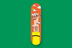 a skateboard with a drawing of a person holding a hot dog on it's side