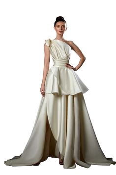 This Ziad Germanos ZG90 dress is perfect for any special occasion. Made from luxurious satin, it features a flattering silhouette that will make you feel like a queen. The delicate ruching detail adds a touch of elegance, while the exposed zipper gives it a modern edge. With its versatile neutral color, this dress can be styled to suit any event. Whether you're attending a black-tie affair or a casual garden party, this dress will have you looking your best. Lebanese Fashion, Black Mermaid Dress, Masquerade Ball Gown, Peplum Gown, Wedding Gowns Vintage, Satin Wedding Dress, Pleated Bodice, Satin Gown, A Line Gown