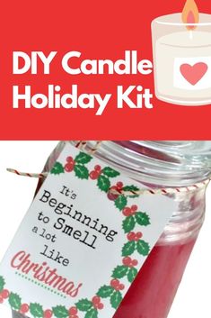 a candle that is sitting in a jar with the words diy candle holiday kit on it