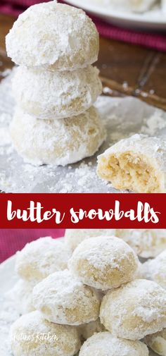 a pile of powdered sugar snowballs sitting on top of a white plate