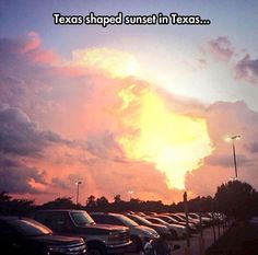 a parking lot filled with lots of cars under a cloudy sky and the words texas even the sunsets know