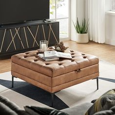 a living room scene with focus on the ottoman