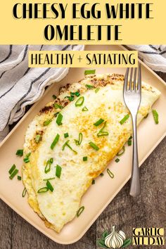 cheesy egg white omelette on a plate with a fork next to it