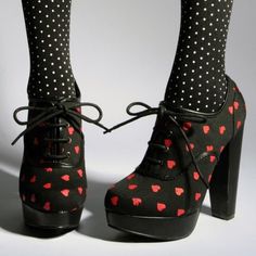 Step out in style with these black platform lace-up boots featuring adorable red heart accents. The chunky heel adds a trendy touch, making them both cute and comfortable. Handcrafted US sizing. Fits true to size. Heel Height: 5.9" / 150 mm approx Product measurements were taken using size 8. Please note that measurements may vary by size. Black Chunky Heel Boots, Black Chunky Heels Boots, Heart Heels, Heart Platforms, Chunky Heel Boots, Black Chunky Heels, Chunky Heels Boots, Red Hearts, Chunky Boots