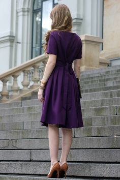 Purple Cocktail Dress For Women, Available In XXS - 5XL Size + Custom Size Purple dress with circle skirts. Golden color detail in neckline. Dress with mid sleeves and zipper on the side, tying belt at the back. The material isvery comfortable for wearing them, slightly elastic and crease.When washing, the color remains the same brightness. ➤ Features > dress length: 105 cm / 41'' > mid sleeves > v neckline with detail > pleats at skirt part > tying waistband at the back ➤ Sizing Purple Fall Dress, Workplace Outfits, Purple Dress Outfits, Purple Dress Casual, Formal Dress Short, Knee Length Dresses Formal, Joan Watson, Purple Short Dress, Purple Clothing