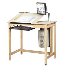 a wooden desk with a computer monitor and keyboard on it's top, sitting in front of a white background