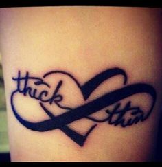 a tattoo with the word luck and two hearts on it