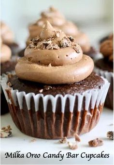 chocolate cupcakes with peanut butter frosting on top