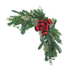 a red and black bow tied to a christmas tree branch with greenery on it