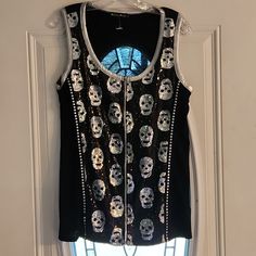 Biker's Pride Black Tank Top With Sequin Skulls - Xl. Actual Tag Fell Off, But Piece Of It Is Still There. Never Worn. Zipper Front. Silver Metallic Trim Around Arms And Neckline. Solid Black Back. Black Biker Top With Skull Print, Edgy Skull Print Top For Party, Edgy Skull Print Party Tops, Black Skull Print Top For Biker Events, Black Rocker Tops With Skull Print, Black Rocker Top With Skull Print, Black Rocker Style Top With Skull Print, Black Edgy Tops For Biker Events, Black Back