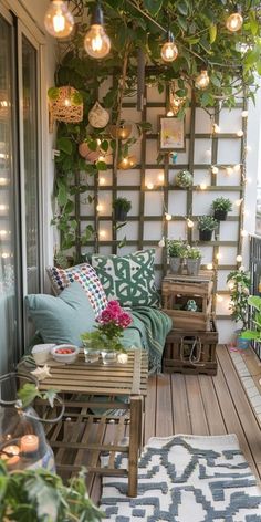 a balcony with lots of plants and lights