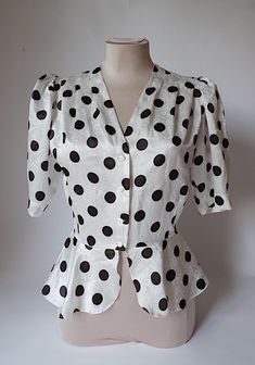 Women's Sataneule Oy Polka Dots Vintage White / Black Blouse Sleeve Elegant Top  Peplum Button Up Top Size 38 Please note that vintage items are pre-owned and minor signs of wear might occur. Every item is hand picked, inspected and repaired if needed. I try my best to point out any significant flaws and signs of wear either in photos or in description. If you have any questions, please let me know! :) Cheap Cotton Polka Dot Blouse, Black And White Blouse, Button Up Top, Hand Picked, Black Blouse, Womens Clothing Tops, White Vintage, White Black, Polka Dot