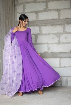 PRODUCT DESCRIPTION :-Festive celebration here we come in this beautiful iris purple anarkali. The iris purple color and lavender organza dupatta are making this anarkali more beautiful.Anarkali :- CottonPant :- CottonDupatta :- Organza silkColor:-Anarkali and dupatta - Purple Pant - PurpleCare Instructions :- Dry clean onlyModel Size :- Model is wearing XS sizeModel Height :- 5.6''DISCLAIMER :- Slight color variations may occur due to different screen resolution. Designer Purple Kurta With Cutdana Details, Purple Kurta With Cutdana For Navratri, Traditional Purple Floor-length Kurta, Bollywood Lavender Anarkali Set With Resham Embroidery, Purple Resham Embroidery Salwar Kameez For Navratri, Semi-stitched Lavender Anarkali Set With Dupatta, Festive Purple Chanderi Salwar Kameez, Diwali Lavender Anarkali Set With Zari Work, Traditional Purple Anarkali Set For Festive Occasion