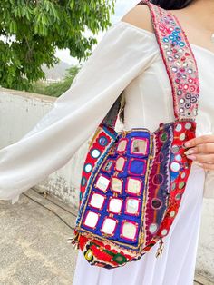 Multicolor Patchwork Hippie Shoulder Bag, Hippie Multicolor Patchwork Shoulder Bag, Festival Patchwork Tote Bag, Multicolor Hippie Shoulder Bag With Patchwork, Bohemian Patchwork Hobo Shoulder Bag, Bohemian Patchwork Hobo Tote Bag, Rectangular Patchwork Shoulder Bag For Festivals, Traditional Multicolor Square Shoulder Bag, Bohemian Patchwork Shoulder Bag