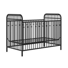 a black metal crib on a white background