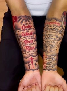 two people with tattoos on their arms, one is holding the other's hands