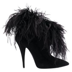 Saint Laurent Zizi 110 Black Suede High Stiletto Heel Ankle Boot Saint Laurent's FW19 runway show saw legs take center stage, with models wearing tiny shorts and mini skirts – the perfect choice to show off this season's statement footwear. Crafted from black suede, leather and feathers, these Zizi 110mm booties feature a pointed toe and a high stiletto heel. Brand new. Made in Italy. Size: 39 (FR) Fit: Saint Laurent shoes usually run small. Please order a 1/2 size larger than you typically wear Saint Laurent Runway, Saint Laurent Boots, Tiny Shorts, Attractive Clothing, Bond Girl, Womens Black Booties, John Fluevog, Yves Saint Laurent Shoes, Couture Mode