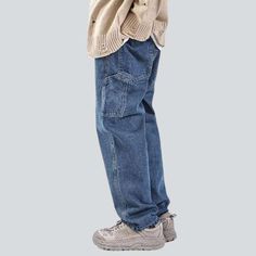 Bringing you back to the 20th-century with a bang. we present the 2023 Spring-Summer Collection's Carpenter Slouchy Men's Denim Pants! A timeless classic. each detail of this medium wash. mid-waist. baggy wonder has been designed to make you look and feel your best.Why You'll Fall In LoveThese pants are the perfect balance between modern style and retro vibes. The 90s-inspired design is complemented by a unique zipper and button closure. ensuring a perfect fit and maximum comfort. Whether you're Baggy Denim Jeans With Patch Pockets, Medium Wash Rigid Denim Cargo Pants With Five Pockets, Vintage Baggy Denim Pants, Washed Blue Jeans For Streetwear With Hip Pockets, Washed Blue Jeans With Hip Pockets For Streetwear, Vintage Relaxed Fit Jeans With Cargo Pockets, Baggy Denim Blue Jeans With Patch Pockets, Baggy Denim Jeans With Hip Pockets, Baggy Washed Blue Jeans With Patch Pockets