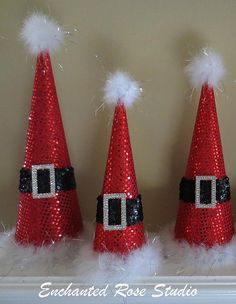 three red santa hats with black and white sequins