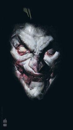 an image of a creepy clown with red eyes and fangs on it's face