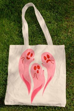 reusable canvas tote bag for the halloween girlies who stay spooky year round 💖👻💗 Tod Bag, Tote Bag Design Ideas, Ghost Heart, Bag Design Ideas, Decorated Tote Bags, Painted Canvas Bags, Ghost Tote Bag