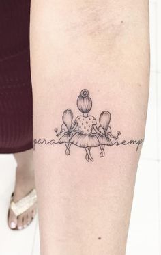 a woman's leg with a tattoo on it