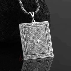 The 99 Names of Allah have deep spiritual significance in Islam. Wearing this pendant allows you to carry these divine attributes with you, serving as a constant reminder of your faith and connection to the Almighty. The precise engraving ensures that each name is beautifully displayed, making this necklace a unique and cherished piece. Are you looking for a truly unique and special piece of jewelry? Look no further than handmade necklaces! Our Handmade necklaces are crafted by skilled artisans who put their time, passion, and creativity into each piece they make. Unlike mass-produced necklaces, handmade necklaces are one-of-a-kind and have a certain character and charm that cannot be replicated. Each pendant is created with a specific design, which means that you can have a necklace that Traditional Medallion Necklace For Good Luck, Traditional Good Luck Medallion Necklace, Rectangular Spiritual Good Luck Jewelry, Rectangular Spiritual Jewelry For Good Luck, Spiritual Rectangular Jewelry For Good Luck, Spiritual Rectangular Good Luck Jewelry, Traditional Rectangular Necklaces For Gifts, Traditional Pendant Necklaces For Good Luck, Traditional Silver Rectangular Necklace