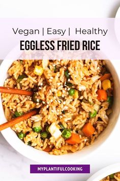 eggless fried rice in a white bowl with chopsticks on the side and text vegan easy healthy eggless fried rice