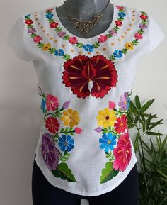 Hand crafted beautiful white Mexican embroidered blouse White Crew Neck Blouse With Floral Embroidery, Fitted White Tops With Machine Embroidery, White Fitted Top With Machine Embroidery, Fitted White Top With Machine Embroidery, White Machine Embroidered Tops For Spring, White Tops With Machine Embroidery For Spring, White Short Sleeve Tops With Machine Embroidery, White Fitted Blouse With Floral Embroidery, Fitted White Blouse With Floral Embroidery