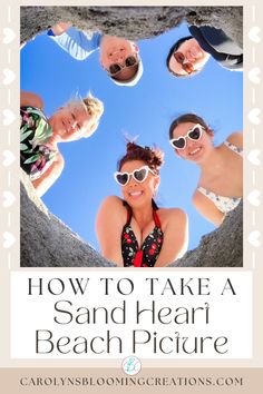 three people are standing in the middle of a heart shaped hole with text overlay how to take a sand heart beach picture