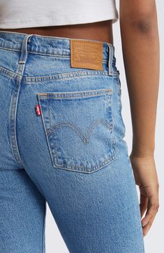 Inspired by cheeky vintage Levi's styles, these low-stretch jeans in a sanded medium wash hug the hips to showcase your curves to greatest effect. Distressed hems add lived-in character to the casual look. 15" leg opening; 11" front rise; 14 1/2" back rise (size 29 x 28) Button fly 99% cotton, 1% elastane Machine wash, tumble dry Imported Levi Wedgie Jeans, Big Wednesday, Levis Wedgie Jeans, Wedgie Jeans, Wardrobe Ideas, Fall Wardrobe, Stretch Jeans, Straight Leg Jeans, Leg Jeans